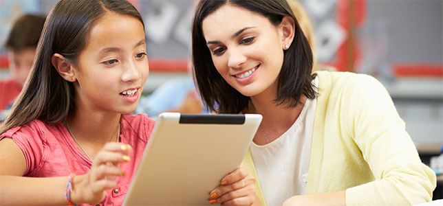 Student using a tablet in class